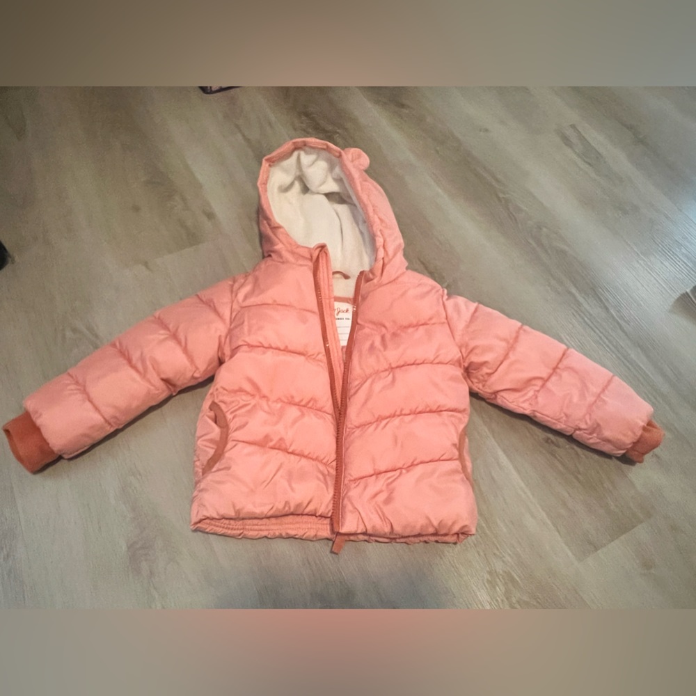 Pink puffer jacket